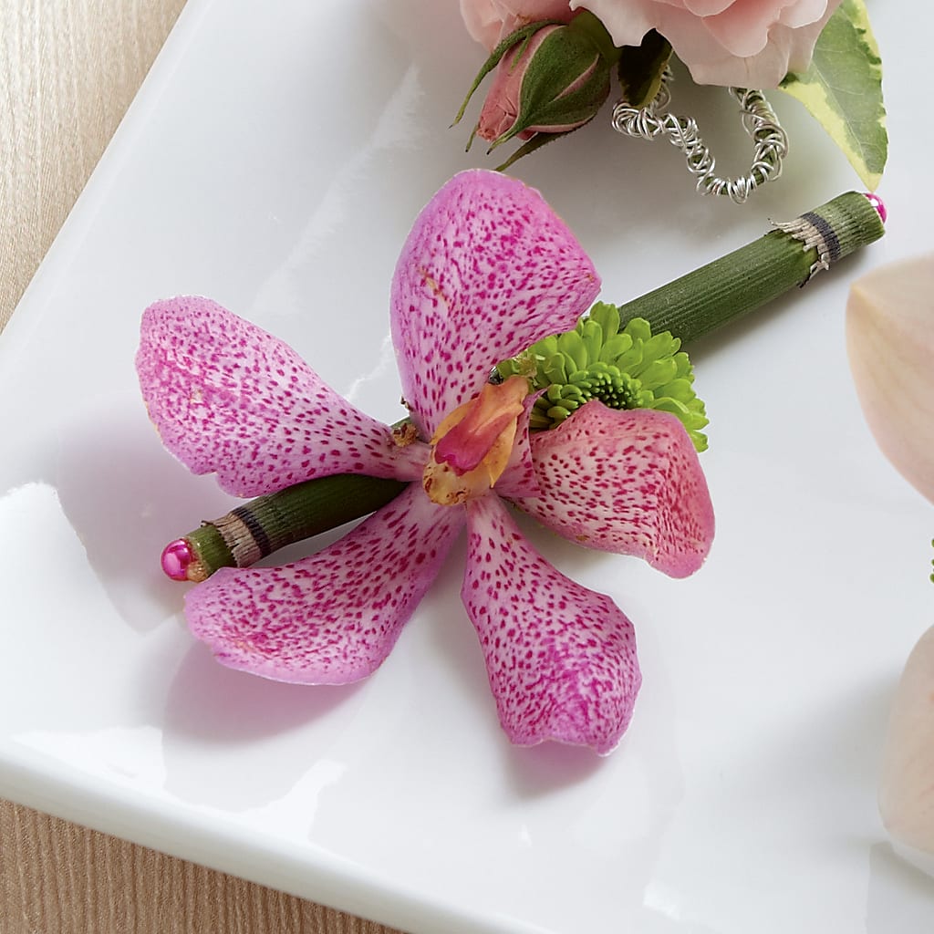 Pink Mokara Boutonniere – Serenity Floral, Lake Geneva WI